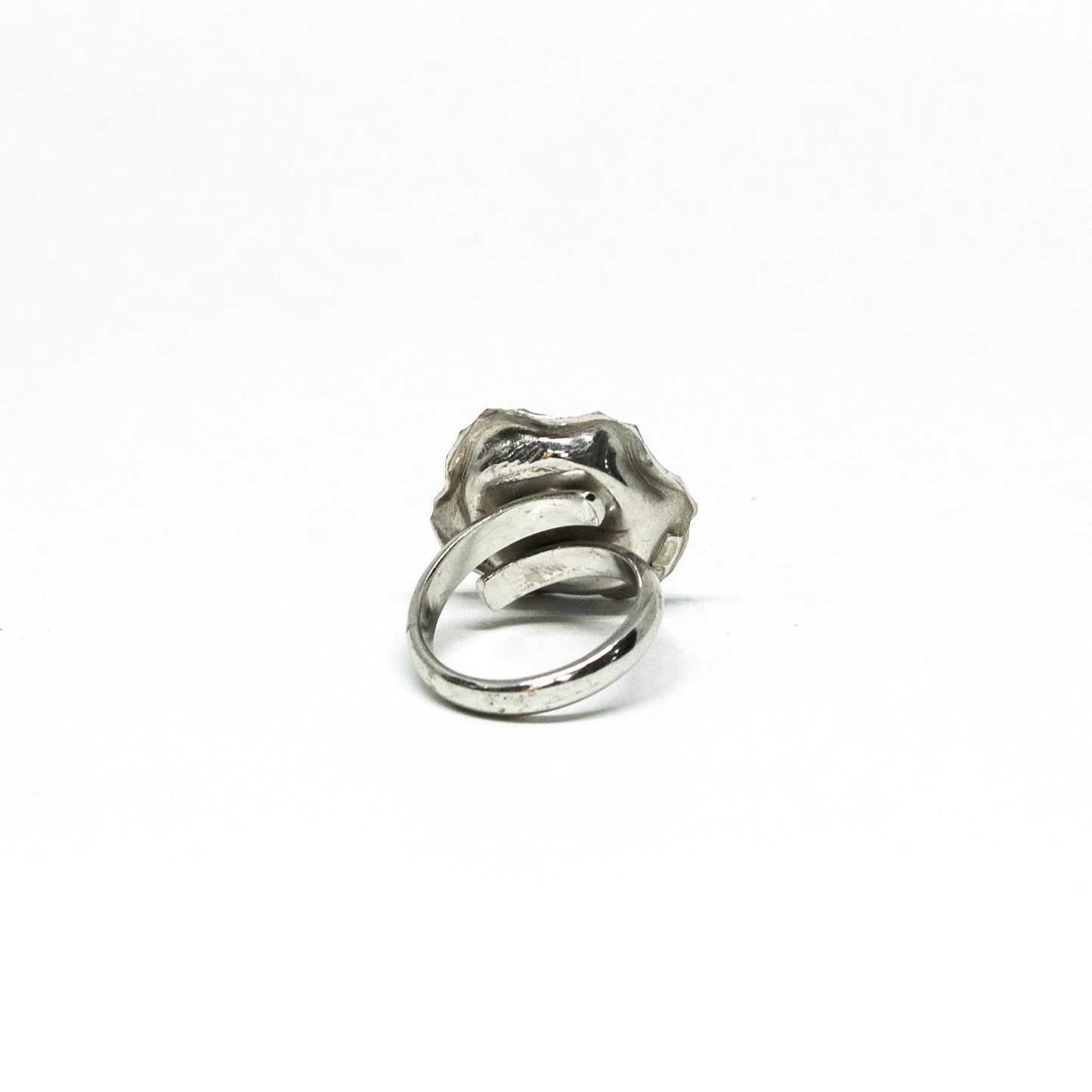 Red coral ring framed by embossed silver