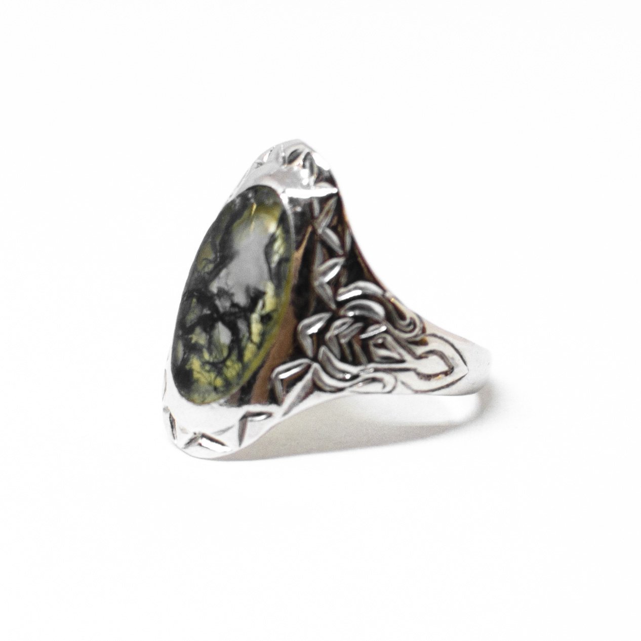 Silver ring with precious stone