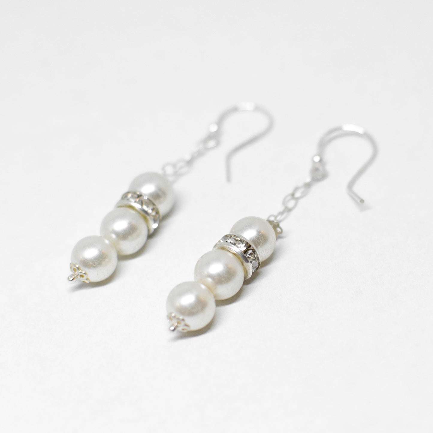 Pearl and zirconia earrings