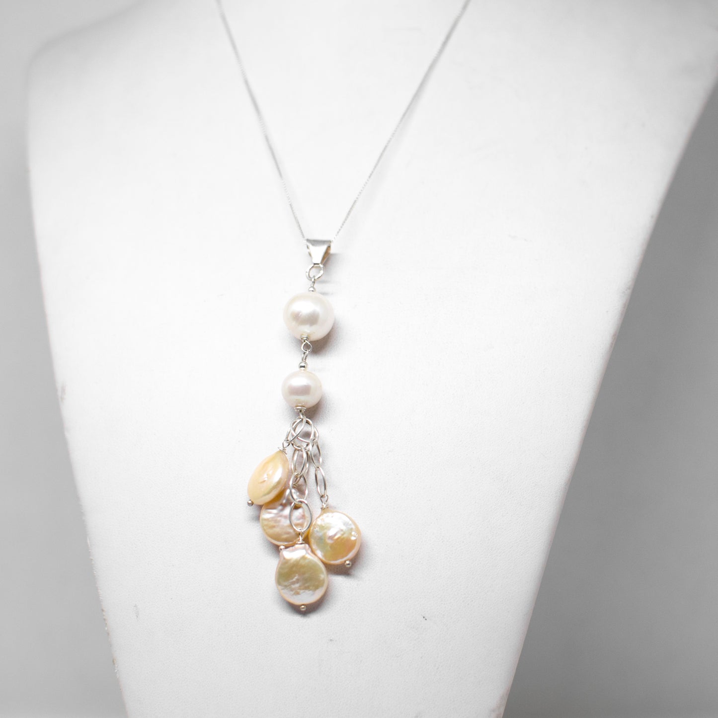 Pearl and mother of pearl pendant