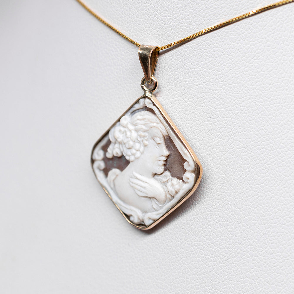 Artistic Cameo Pendant Woman's Face with Hand in Gold