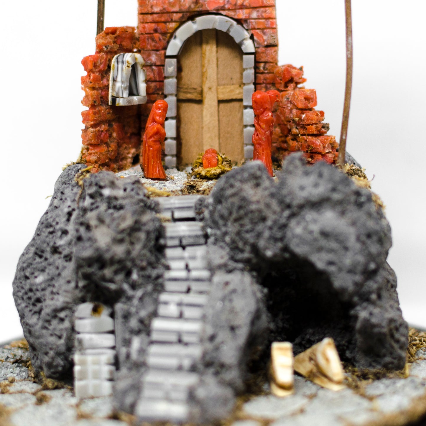 Nativity scene in coral and lava stone
